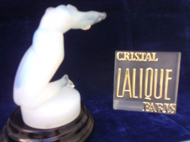 This is a wonderful Chrysis in opalescent milky-blue (discontinued) by Cristal Lalique of Paris.