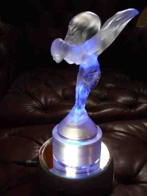 RR mascot by Lalique. Commissioned by Rolls-Royce to be produced by Christal Lalique et Cie as exclusive gifts.  Signed 'Lalique registered France' in engraved scrolling script, RR official logo to the bottom of the base along with the Lalique logo to front of the statue. Has its own individual number (on the underside of the base) out of a limited edition of *200 produced in 1994 for the 90th anniversary of Rolls-Royce and given to selected loyal dealerships and privileged customers. Approximately 7 ½ inches / 190 mm. High.   Note: None were again commissioned for the 100th anniversary and none have been produced since. Apologies for my photos which don't do the very fine details justice here! Every minute aspect of this fine sculpture has been captured by the artist Charles Sykes.  It is in superb mint condition and a great investment piece! Please contact us for more details and price.  *Most are still with dealerships, some in private collections and museums, some are damaged or chipped and have lost the certificate and boxes etc. In trading for over 40 years now this is only the fifth piece we've had through our hands, and is the very best piece! Our example is mint, perfect and complete!